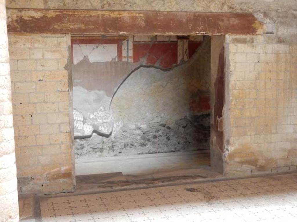 V.8 Herculaneum, May 2018. Room 4, looking towards north wall of courtyard and larger doorway to Room 5.
Photo courtesy of Buzz Ferebee.
